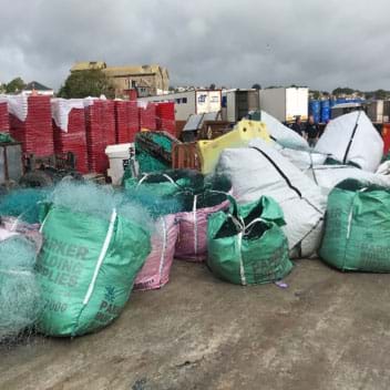 Photo of large bags full of fishing nets