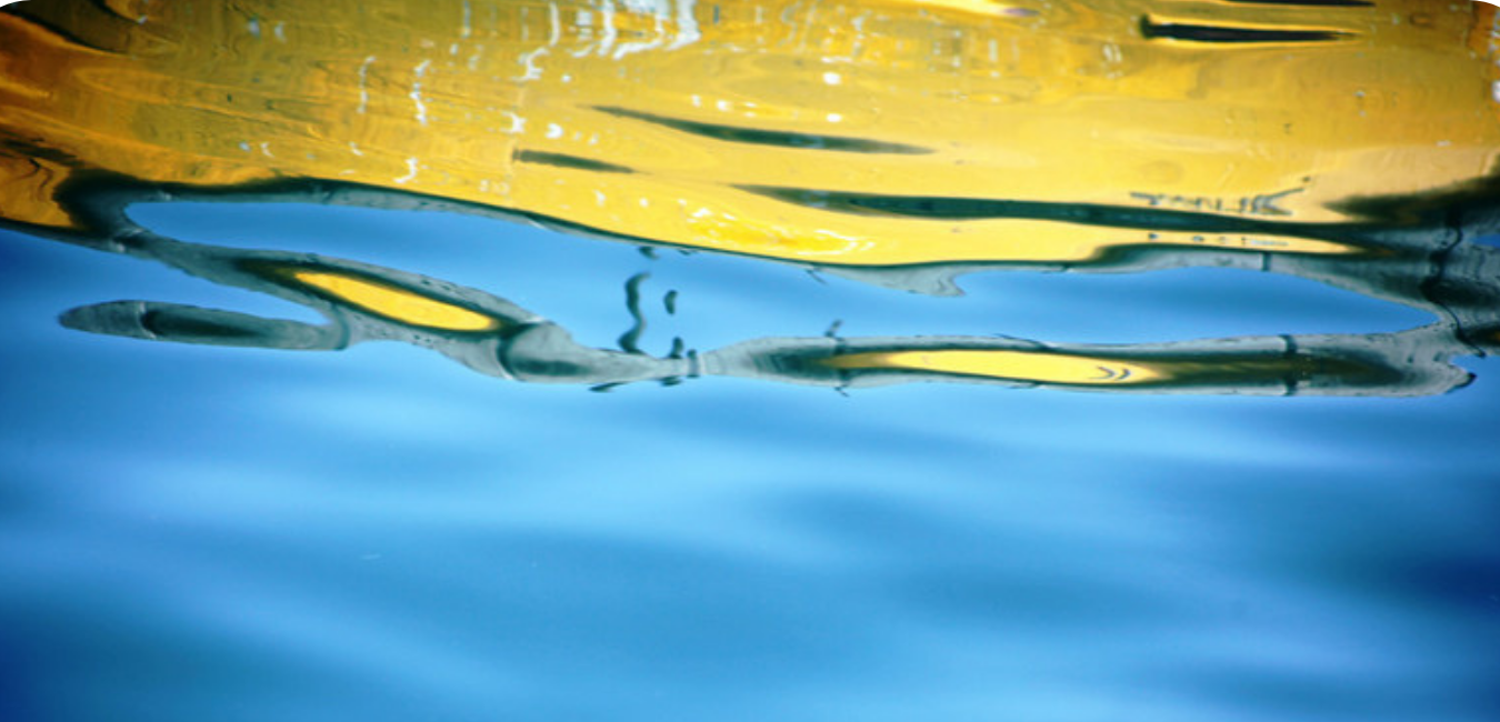 Reflection of boat in water
