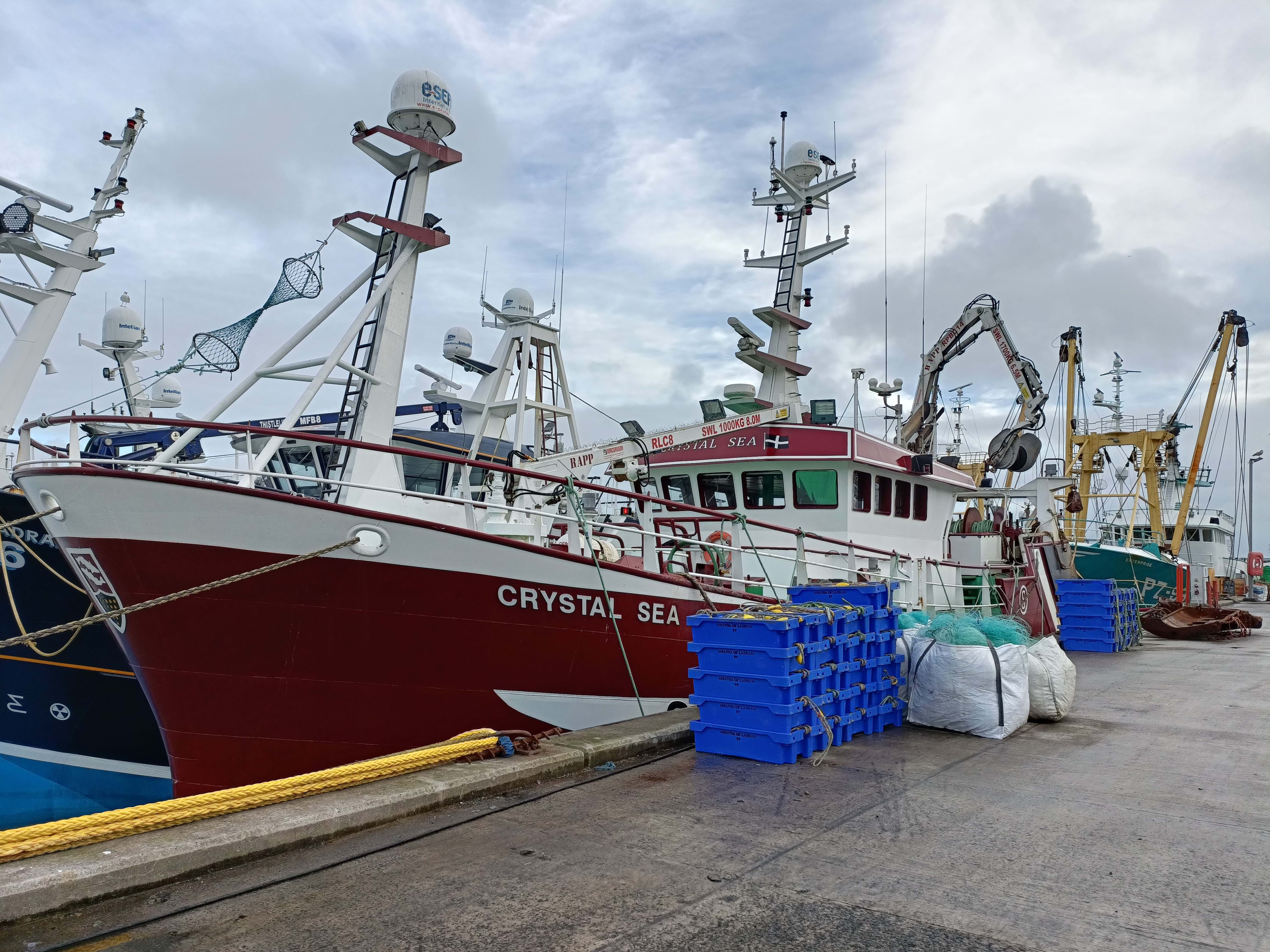 An image of the Crystal Sea trawler in a dock