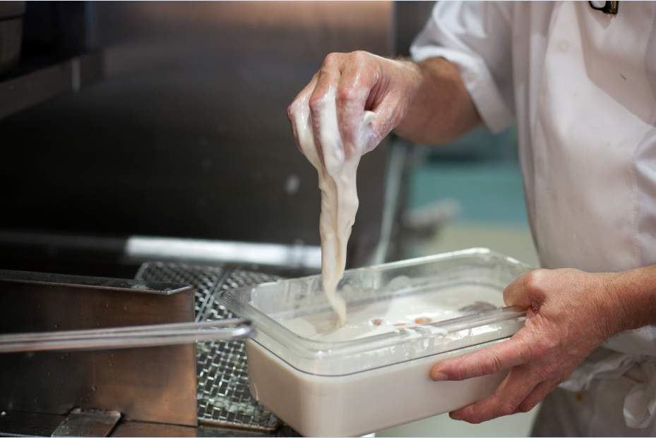 Fish being prepared in food service